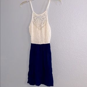 White lace and navy blue dress